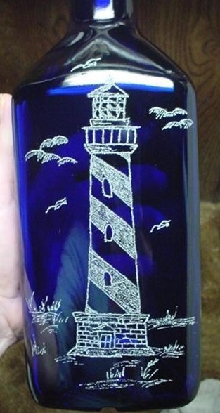lighthouse on blue bottle