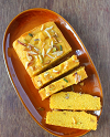 mango suji cake recipe in Hindi Logo