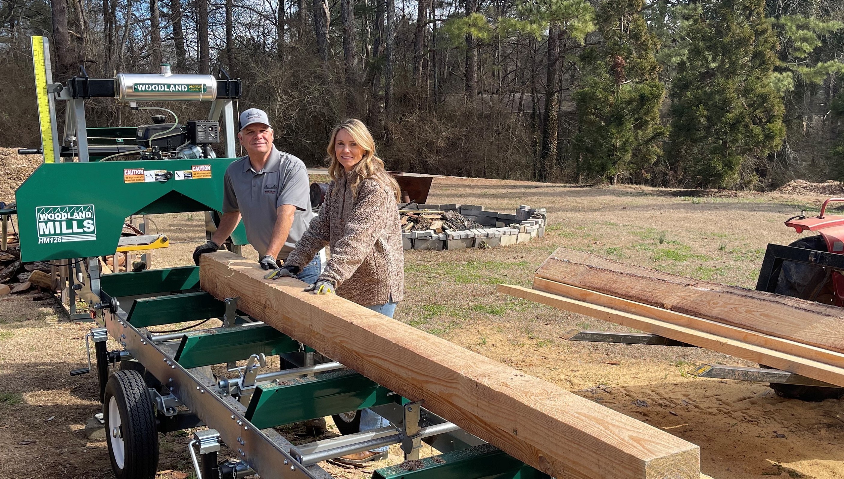 Tyler And Alyson working at sawmill 