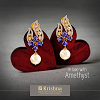 Gold with diamond earrings with blue stone