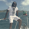 The Universe Boss Chris Gayle chillin' in Attiitude crew neck white t-shirt.  