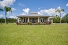 The-Buyer’s-Agent-Offers-a-Single-Family-Home-on-a-Wide-Green-Yard