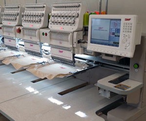 Commercial-Embroidery-Machines-Makes-Your-Business-Grow-300x249