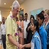 3.	Clinton interacts with some of the school children 