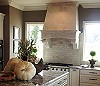 Natural Stone Rangehood and Tiled Backsplash