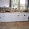 Exact Tile Inc - Laundry Room Backsplash and Tiled Floor - exacttile.com