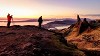 Two photographers at sunrise at the Old Man of Storr