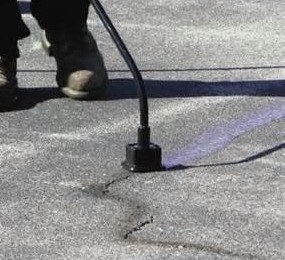What should be done about cracks in your asphalt?  
