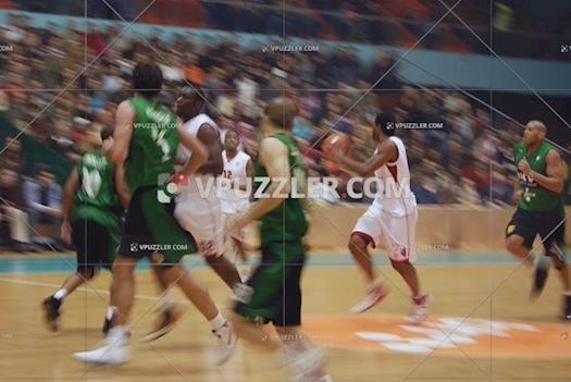Stock Image - Game basketball players in action