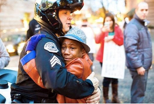 Boy and Police Officer In the Wake of Ferguson