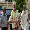 2.	Clinton is taken on a tour of the school by Madhu Pandit Dasa, Chairman, The Akshaya Patra Founda