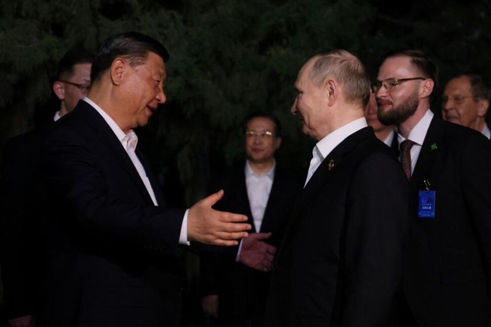 Hugs but Not the Full Socialist-Era Kiss for Putin, Xi in Beijing