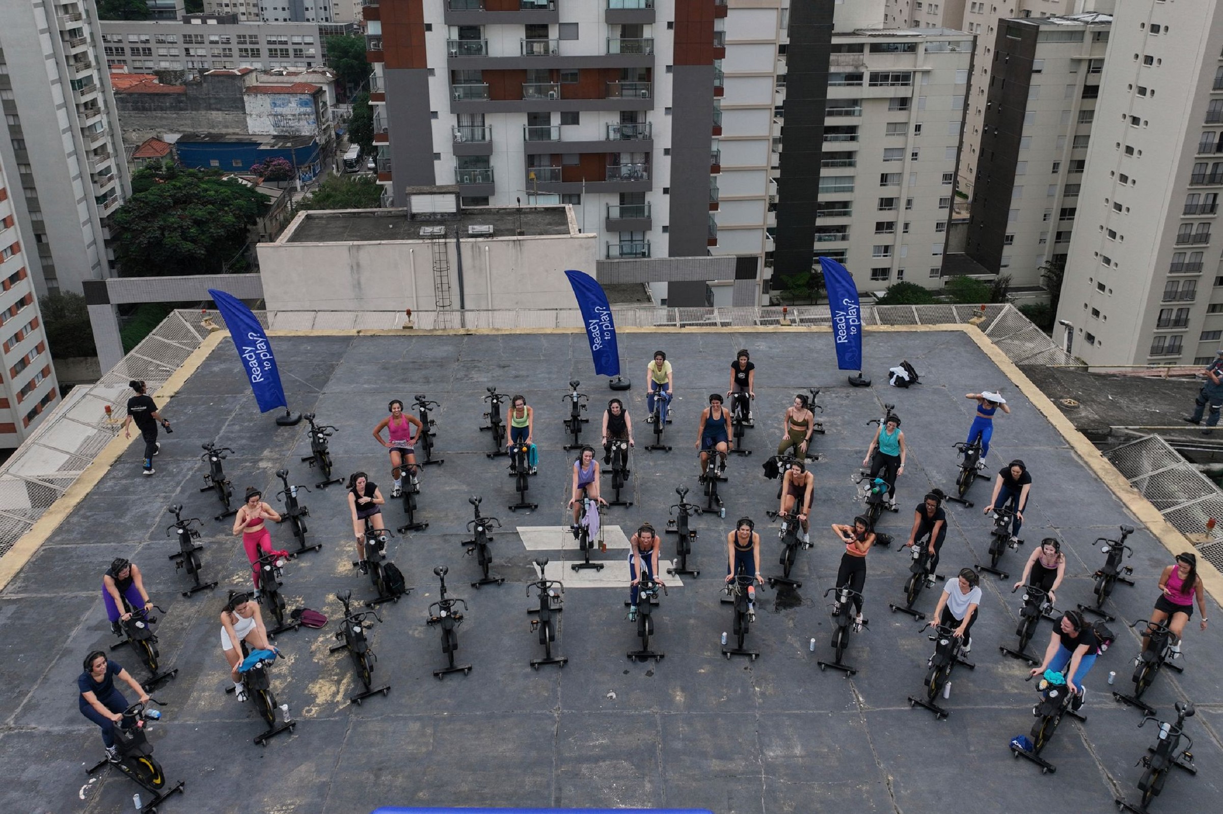 Up, up and spinning away. More Brazilians taking outdoor spin classes on helipads