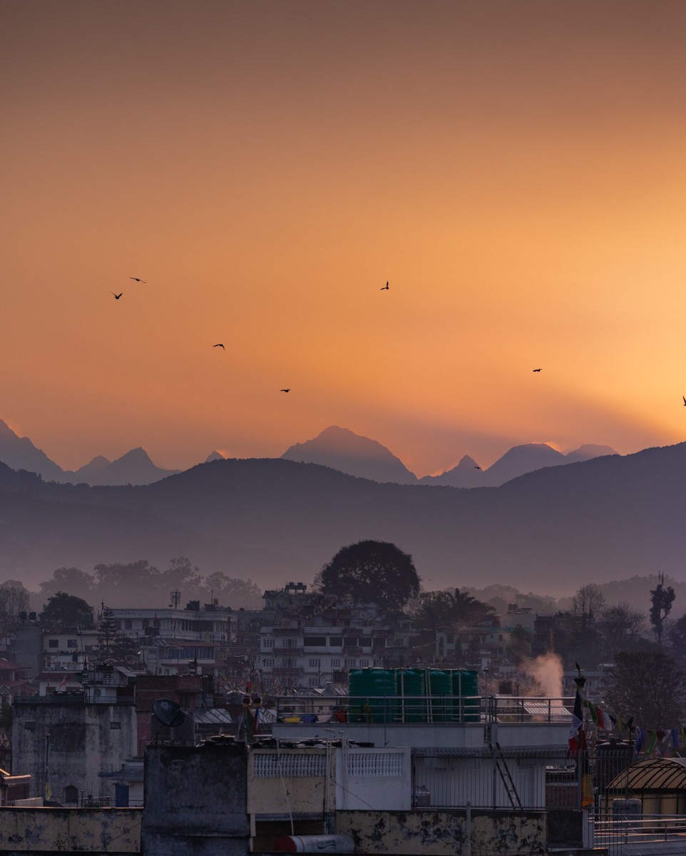 Photo by @emilypolar | On a clear morning in the Kathmandu Valley, the Himalaya are revealed to the northeast as birds f...