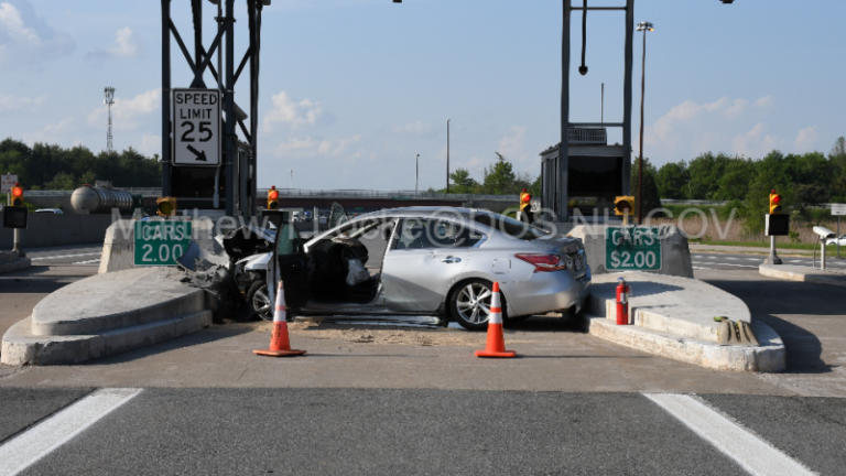 Two people injured in N.H. toll booth crash